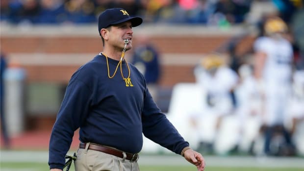 michigan-jim-harbaugh-softball-home-run.jpg